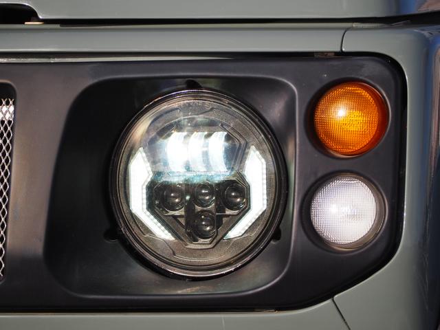 ジムニー ワイルドウインド　ユーザー様買取車　リフトアップ　オーバーフェンダー　１５ＡＷ　ジオランダーＡＴタイヤ　Ｆ／Ｒパイプバンパー　社外マフラー／グリル　ＬＥＤライト／テール　ＣＤ　Ｂｌｕｅｔｏｏｔｈ　ｉＰｏｄ　シートカバー（8枚目）