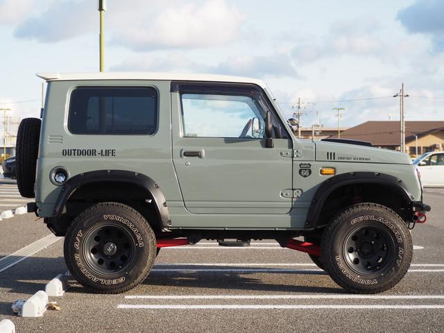 ジムニー ワイルドウインド　ユーザー様買取車　リフトアップ　オーバーフェンダー　１５ＡＷ　ジオランダーＡＴタイヤ　Ｆ／Ｒパイプバンパー　社外マフラー／グリル　ＬＥＤライト／テール　ＣＤ　Ｂｌｕｅｔｏｏｔｈ　ｉＰｏｄ　シートカバー（10枚目）