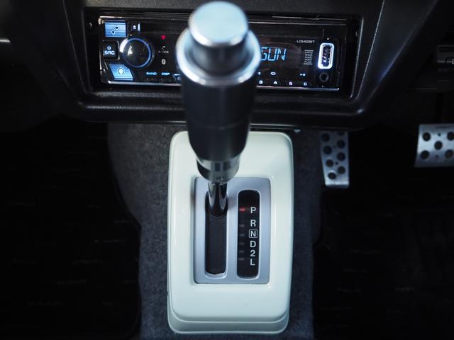 ジムニー ワイルドウインド　ユーザー様買取車　リフトアップ　オーバーフェンダー　１５ＡＷ　ジオランダーＡＴタイヤ　Ｆ／Ｒパイプバンパー　社外マフラー／グリル　ＬＥＤライト／テール　ＣＤ　Ｂｌｕｅｔｏｏｔｈ　ｉＰｏｄ　シートカバー（29枚目）