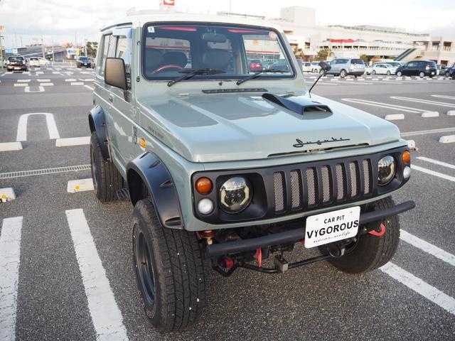 ジムニー ワイルドウインド　ユーザー様買取車　リフトアップ　オーバーフェンダー　１５ＡＷ　ジオランダーＡＴタイヤ　Ｆ／Ｒパイプバンパー　社外マフラー／グリル　ＬＥＤライト／テール　ＣＤ　Ｂｌｕｅｔｏｏｔｈ　ｉＰｏｄ　シートカバー（59枚目）