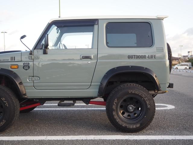 ジムニー ワイルドウインド　ユーザー様買取車　リフトアップ　オーバーフェンダー　１５ＡＷ　ジオランダーＡＴタイヤ　Ｆ／Ｒパイプバンパー　社外マフラー／グリル　ＬＥＤライト／テール　ＣＤ　Ｂｌｕｅｔｏｏｔｈ　ｉＰｏｄ　シートカバー（63枚目）