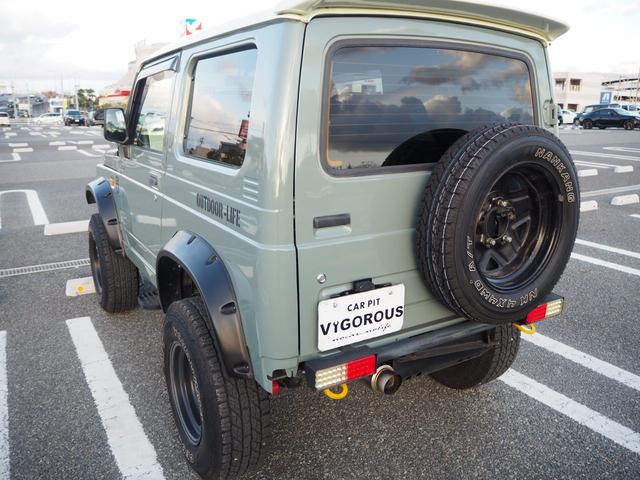ジムニー ワイルドウインド　ユーザー様買取車　リフトアップ　オーバーフェンダー　１５ＡＷ　ジオランダーＡＴタイヤ　Ｆ／Ｒパイプバンパー　社外マフラー／グリル　ＬＥＤライト／テール　ＣＤ　Ｂｌｕｅｔｏｏｔｈ　ｉＰｏｄ　シートカバー（69枚目）
