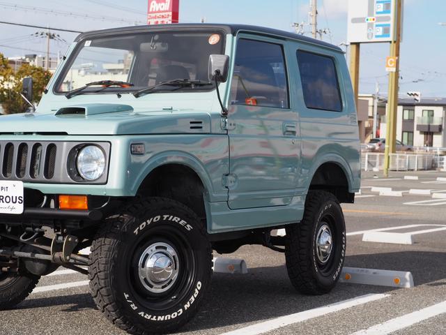 ジムニー ワイルドウインドリミテッド　リフトアップ　ＤＥＡＮ１６ＡＷ　ＴＯＹＯＲ／Ｔタイヤ　社外（前後バンパー／グリル／マフラー／ハンドル）　ＲＡＹＢＲＩＧライト　ＬＥＤテール　ｉＰｏｄ　ＥＴＣ　シートカバー（6枚目）