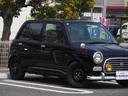 ミラジーノ ジーノ　ローダウン　１３ｉｎ鉄ホイル　スタッドレスタイヤ　センター出しマフラー　フェンダーミラー　ＨＤＤナビ　地デジ　ＤＶＤ／ＣＤ／Ｂｌｕｅｔｏｏｔｈ／ｉＰｏｄ　ＥＴＣ　ウッドコンビハンドル（5枚目）