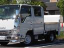 エルフトラック Ｗキャブフラットロー　極東パワーゲート　昇降荷重６００ｋｇ（１５７ｃｍ×８７ｃｍ）　最積１４５０ｋｇ　荷台内寸２０３ｃｍ×１６１ｃｍ×３８ｃｍ　後輪Ｗタイヤ　シートカバー　メッキパーツ　荷台／アオリ縞板　ＥＴＣ　キーレス（6枚目）