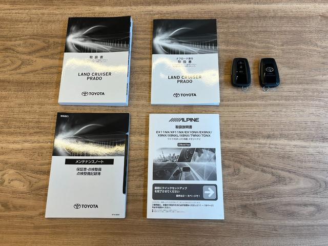 ランドクルーザープラド TX Lパッケージ ムーンルーフ/ブラックルーフレール/19インチ純正アルミホイール/モデリスタ フロントスポイラー/モデリスタ リアスカート/モデリスタリアスポイラー/純正OPウッド調ステアリング/アルパインナビ(6枚目)