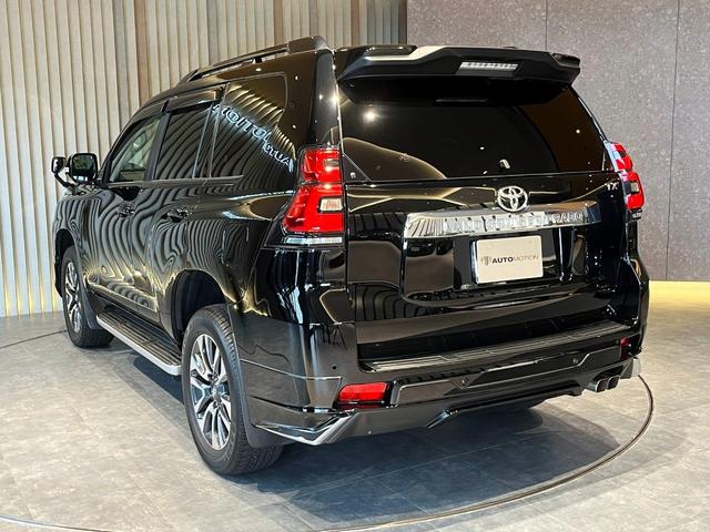 ランドクルーザープラド TX Lパッケージ ムーンルーフ/ブラックルーフレール/19インチ純正アルミホイール/モデリスタ フロントスポイラー/モデリスタ リアスカート/モデリスタリアスポイラー/純正OPウッド調ステアリング/アルパインナビ(9枚目)