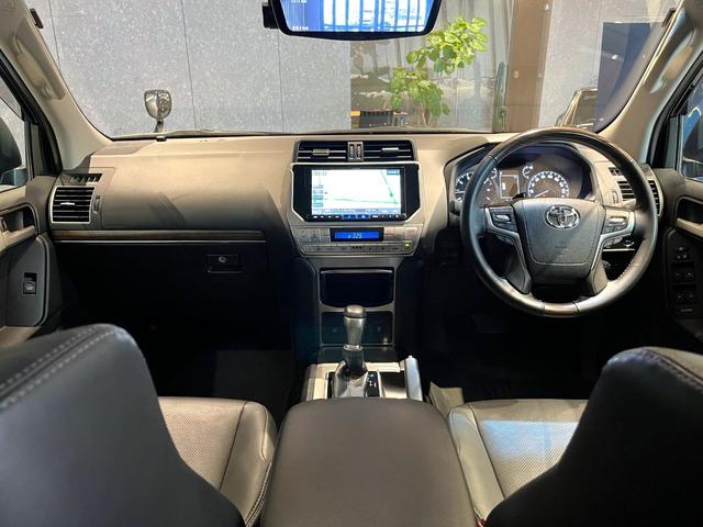 ランドクルーザープラド TX Lパッケージ ムーンルーフ/ブラックルーフレール/19インチ純正アルミホイール/モデリスタ フロントスポイラー/モデリスタ リアスカート/モデリスタリアスポイラー/純正OPウッド調ステアリング/アルパインナビ(12枚目)