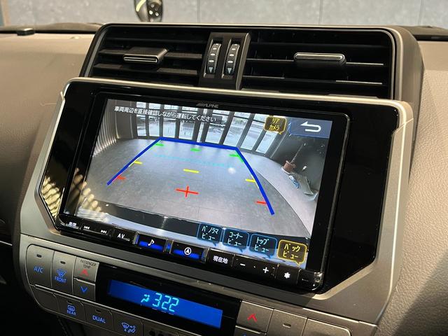 ランドクルーザープラド TX Lパッケージ ムーンルーフ/ブラックルーフレール/19インチ純正アルミホイール/モデリスタ フロントスポイラー/モデリスタ リアスカート/モデリスタリアスポイラー/純正OPウッド調ステアリング/アルパインナビ(13枚目)