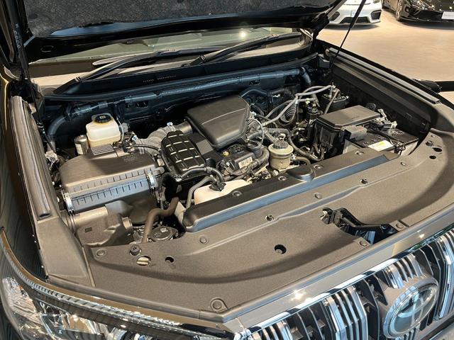 ランドクルーザープラド TX Lパッケージ ムーンルーフ/ブラックルーフレール/19インチ純正アルミホイール/モデリスタ フロントスポイラー/モデリスタ リアスカート/モデリスタリアスポイラー/純正OPウッド調ステアリング/アルパインナビ(19枚目)