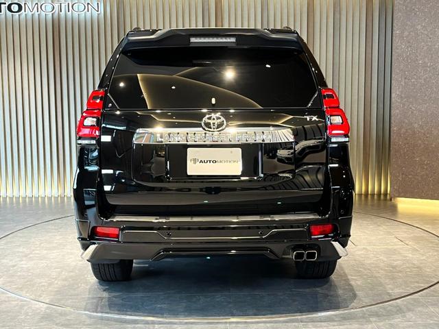ランドクルーザープラド TX Lパッケージ ムーンルーフ/ブラックルーフレール/19インチ純正アルミホイール/モデリスタ フロントスポイラー/モデリスタ リアスカート/モデリスタリアスポイラー/純正OPウッド調ステアリング/アルパインナビ(35枚目)