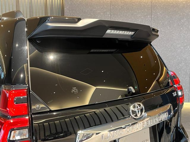 ランドクルーザープラド TX Lパッケージ ムーンルーフ/ブラックルーフレール/19インチ純正アルミホイール/モデリスタ フロントスポイラー/モデリスタ リアスカート/モデリスタリアスポイラー/純正OPウッド調ステアリング/アルパインナビ(39枚目)