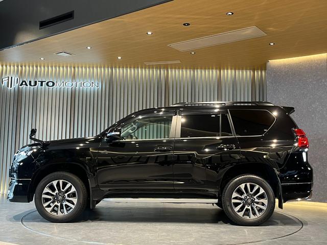 ランドクルーザープラド TX Lパッケージ ムーンルーフ/ブラックルーフレール/19インチ純正アルミホイール/モデリスタ フロントスポイラー/モデリスタ リアスカート/モデリスタリアスポイラー/純正OPウッド調ステアリング/アルパインナビ(40枚目)