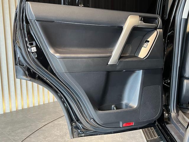 ランドクルーザープラド TX Lパッケージ ムーンルーフ/ブラックルーフレール/19インチ純正アルミホイール/モデリスタ フロントスポイラー/モデリスタ リアスカート/モデリスタリアスポイラー/純正OPウッド調ステアリング/アルパインナビ(70枚目)