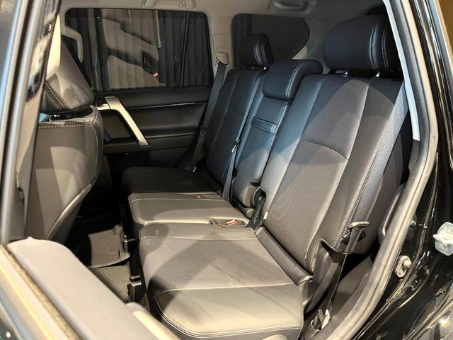 ランドクルーザープラド TX Lパッケージ ムーンルーフ/ブラックルーフレール/19インチ純正アルミホイール/モデリスタ フロントスポイラー/モデリスタ リアスカート/モデリスタリアスポイラー/純正OPウッド調ステアリング/アルパインナビ(75枚目)