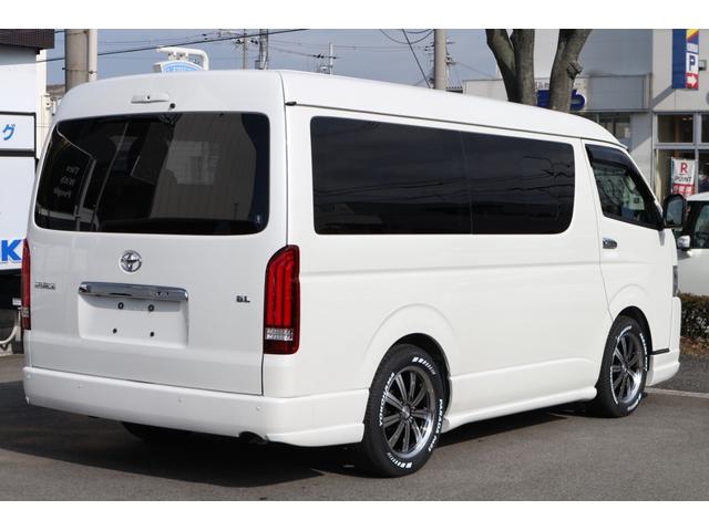 GL GL 3列目対面ラウンジベット家具フローリングカスタムコンプリート3エアロパッケージアルパイン11inナビ12.8inフリップダウンモニターバケットシートカバーウッドインテリア車中泊アウトドア仕様(5枚目)