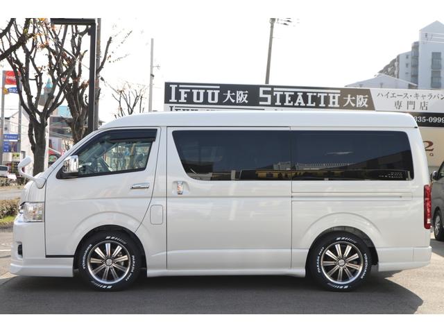 GL GL 3列目対面ラウンジベット家具フローリングカスタムコンプリート3エアロパッケージアルパイン11inナビ12.8inフリップダウンモニターバケットシートカバーウッドインテリア車中泊アウトドア仕様(7枚目)