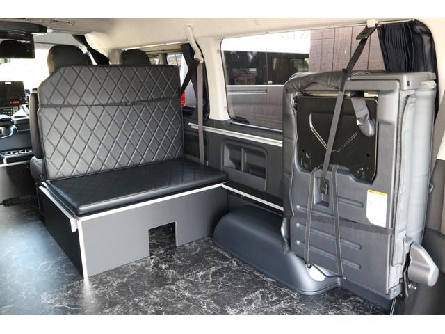 GL GL 3列目対面ラウンジベット家具フローリングカスタムコンプリート3エアロパッケージアルパイン11inナビ12.8inフリップダウンモニターバケットシートカバーウッドインテリア車中泊アウトドア仕様(10枚目)