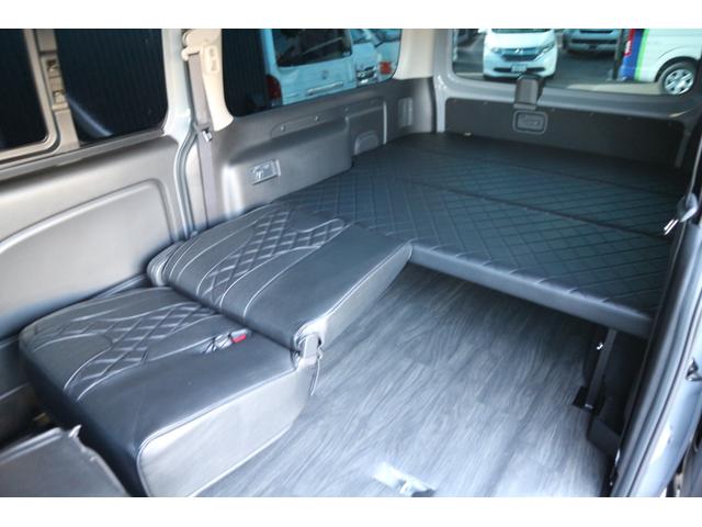 キャラバン ロンググランドプレミアムＧＸ　カスタムコンプリートＤｙｎａｓｔｙＧＲＯＵＮＤバンパープロテクターオーバーフェンダーバケットシートカバーベッドキット重歩行用フロアシート地ナビ後席モニターセンターコンソール寒冷地仕様シートヒーター（33枚目）