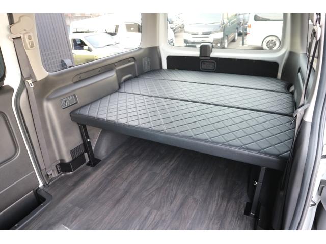 キャラバン ロンググランドプレミアムＧＸ　カスタムコンプリートバンパープロテクターブラックＬＥＤヘッドライトオーバーフェンダー１８ｉｎアルミバケットシートカバーベッドキット地ナビ後席モニターミラーリングセンターコンソール重歩行用フロアシート（32枚目）