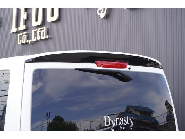 キャラバン ロンググランドプレミアムＧＸ　ＤｙｎａｓｔｙＡＬＡＩＶＥ・ＧＴ－ｖフルエアロカスタムコンプリートオーバーフェンダー１８ｉｎアルミバケットシートカバーベットキット９ｉｎナビ後席モニターセンターコンソールレッドインテリア電動スライド（29枚目）
