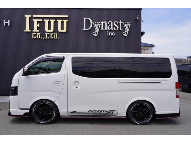 キャラバン ロンググランドプレミアムＧＸ　ＤｙｎａｓｔｙＡＬＡＩＶＥ・ＧＴ－ｖフルエアロカスタムコンプリートオーバーフェンダー１８ｉｎアルミバケットシートカバーベットキット９ｉｎナビ後席モニターセンターコンソールレッドインテリア電動スライド（35枚目）