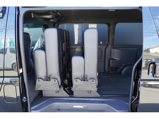 ハイエースバン スーパーＧＬ　ダークプライムＩＩ　２．８Ｄ－Ｔ２ＷＤ３列ＲＥＶＯシート２脚４ナンバー８人ロングスライドレールフローリングフルフラットベッド対面ラウンジアルパインＢＩＧＸ１１ｉｎナビ後席１２．８ｉｎモニター天井スピーカセンターコンソール（40枚目）