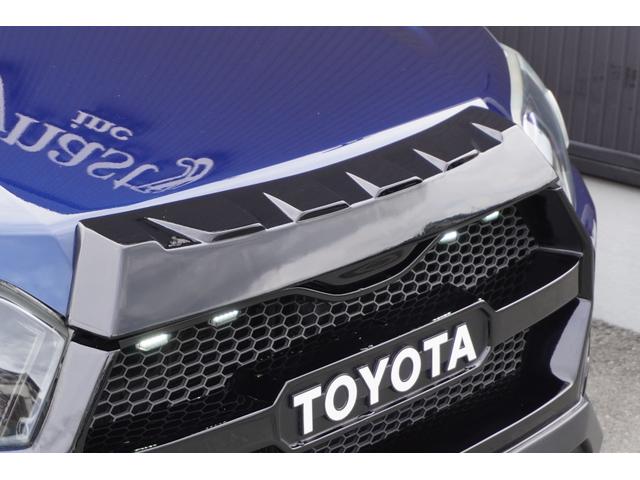 プロボックス DXコンフォート カスタムギアコンプリートDynastyグランドエアロ1眼プロジェクターLEDヘッドライトTOYOオープンカントリーRTタイヤレザ-シ-トカバ-ベッドマット重歩行用フロアシート助手席テーブル(6枚目)