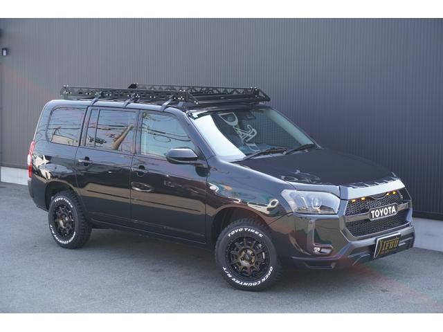 プロボックス F カスタムギアリフトアップDynastyGROUNDバンパーLEDヘッドライトラプター塗装DピラースピーカキットCFマットコーデュロイバケットシートカバー助手席テーブル地ナビピアノブラックインテリア(2枚目)