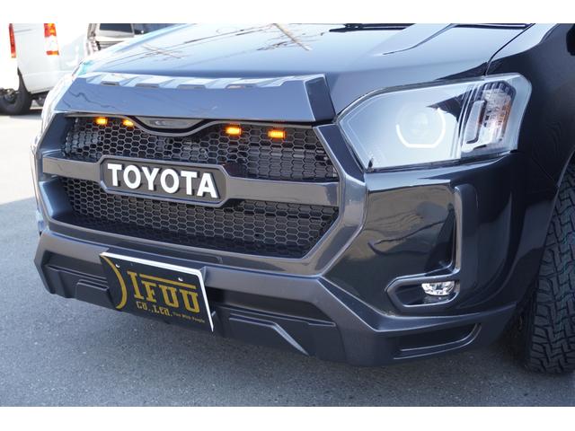 プロボックス F カスタムギアリフトアップDynastyGROUNDバンパーLEDヘッドライトラプター塗装DピラースピーカキットCFマットコーデュロイバケットシートカバー助手席テーブル地ナビピアノブラックインテリア(14枚目)