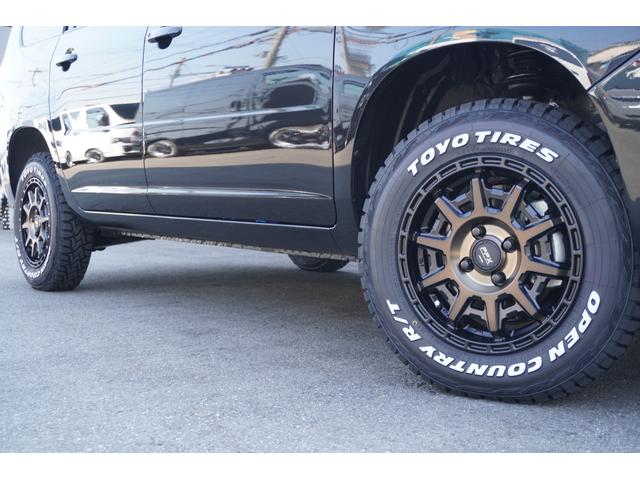 プロボックス F カスタムギアリフトアップDynastyGROUNDバンパーLEDヘッドライトラプター塗装DピラースピーカキットCFマットコーデュロイバケットシートカバー助手席テーブル地ナビピアノブラックインテリア(20枚目)