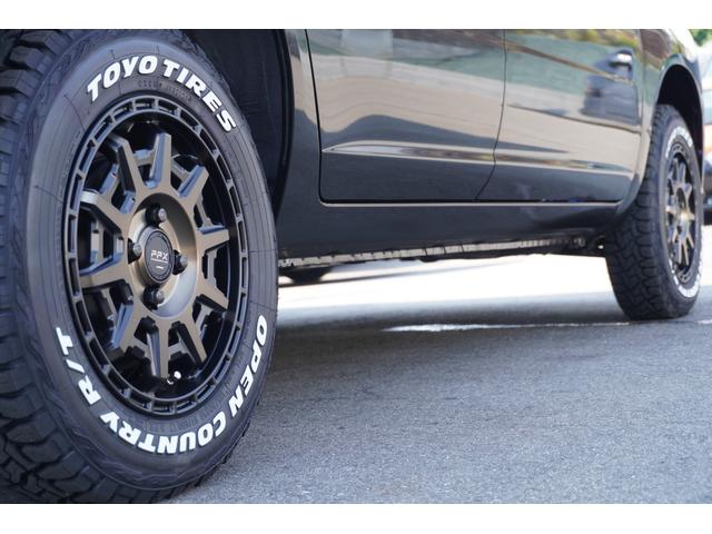 プロボックス F カスタムギアリフトアップDynastyGROUNDバンパーLEDヘッドライトラプター塗装DピラースピーカキットCFマットコーデュロイバケットシートカバー助手席テーブル地ナビピアノブラックインテリア(25枚目)