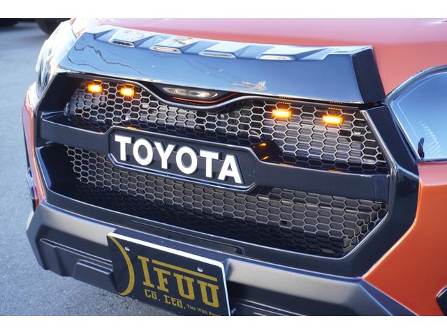 プロボックス ハイブリッドＦ　カスタムギアコンプリートＤｙｎａｓｔｙ前後バンパーＬＥＤプロジェクターヘッドライトＲＴタイヤヴィンテージレザーシートカバーＤピラースピーカーゼブラウッドインテリア助手席テーブルセンターコンソール（18枚目）