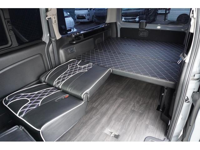 キャラバン ロンググランドプレミアムＧＸ　ＤｙｎａｓｔｙＧＴ－ｖフルエアロカスタムコンプリートオーバーフェンダー１７ｉｎアルミバケットシートカバーベットキット重歩行用フロアシートラゲッジサイドテーブル地ナビ後席モニターセンターコンソール（45枚目）