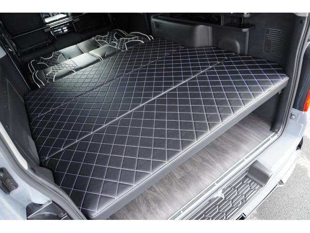 キャラバン ロンググランドプレミアムＧＸ　ＤｙｎａｓｔｙＧＴ－ｖフルエアロカスタムコンプリートオーバーフェンダー１７ｉｎアルミバケットシートカバーベットキット重歩行用フロアシートラゲッジサイドテーブル地ナビ後席モニターセンターコンソール（48枚目）