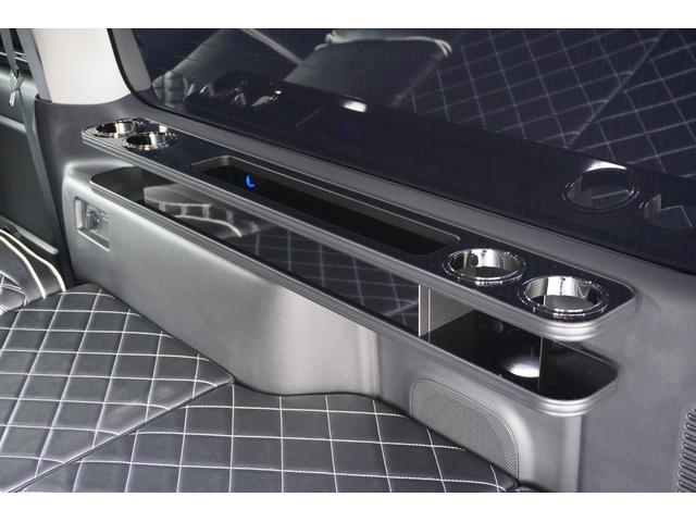 キャラバン ロンググランドプレミアムＧＸ　ＤｙｎａｓｔｙＧＴ－ｖフルエアロカスタムコンプリートオーバーフェンダー１７ｉｎアルミバケットシートカバーベットキット重歩行用フロアシートラゲッジサイドテーブル地ナビ後席モニターセンターコンソール（49枚目）