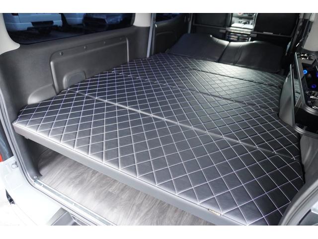 キャラバン ロンググランドプレミアムＧＸ　ＤｙｎａｓｔｙＧＴ－ｖフルエアロカスタムコンプリートオーバーフェンダー１７ｉｎアルミバケットシートカバーベットキット重歩行用フロアシートラゲッジサイドテーブル地ナビ後席モニターセンターコンソール（52枚目）