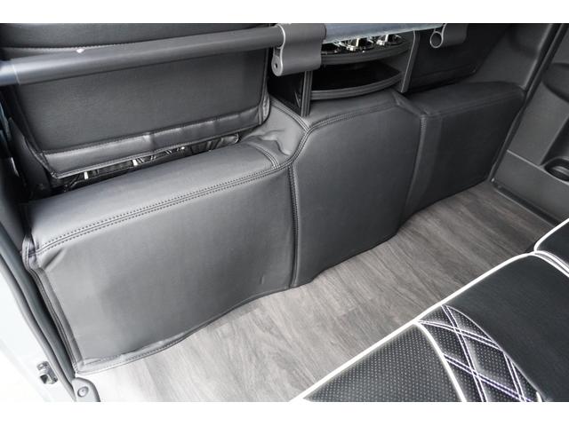 キャラバン ロンググランドプレミアムＧＸ　ＤｙｎａｓｔｙＧＴ－ｖフルエアロカスタムコンプリートオーバーフェンダー１７ｉｎアルミバケットシートカバーベットキット重歩行用フロアシートラゲッジサイドテーブル地ナビ後席モニターセンターコンソール（56枚目）