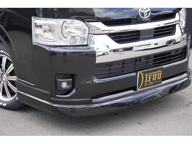 ハイエースワゴン ＧＬ　登録済未使用車３列目対面ラウンジベッド家具オプションベッドフローリングテーブルカスタムコンプリートＩＦ－ＷＢ８フルフラット対面ラウンジアルパインＢＩＧＸ１１ナビ後席１２．８モニターセンターコンソール（5枚目）