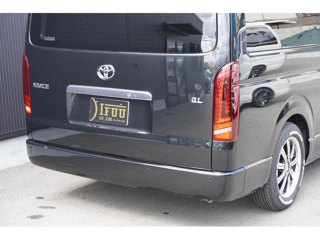 ハイエースワゴン ＧＬ　登録済未使用車３列目対面ラウンジベッド家具オプションベッドフローリングテーブルカスタムコンプリートＩＦ－ＷＢ８フルフラット対面ラウンジアルパインＢＩＧＸ１１ナビ後席１２．８モニターセンターコンソール（14枚目）