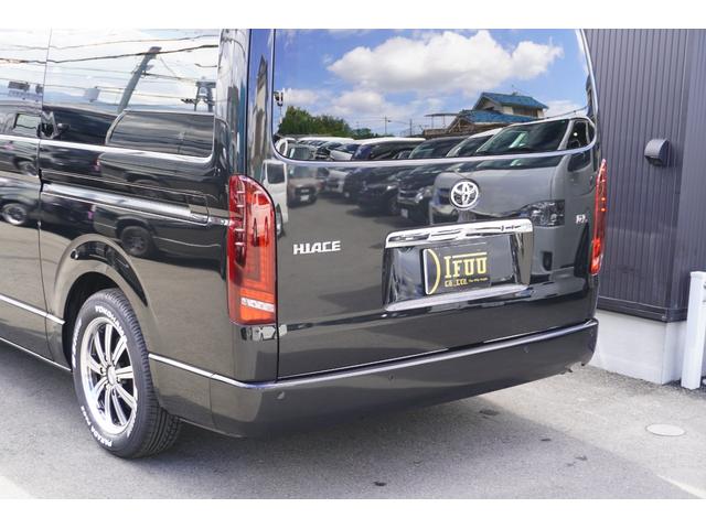 ハイエースワゴン ＧＬ　登録済未使用車３列目対面ラウンジベッド家具オプションベッドフローリングテーブルカスタムコンプリートＩＦ－ＷＢ８フルフラット対面ラウンジアルパインＢＩＧＸ１１ナビ後席１２．８モニターセンターコンソール（19枚目）