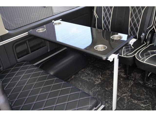 ハイエースワゴン ＧＬ　登録済未使用車３列目対面ラウンジベッド家具オプションベッドフローリングテーブルカスタムコンプリートＩＦ－ＷＢ８フルフラット対面ラウンジアルパインＢＩＧＸ１１ナビ後席１２．８モニターセンターコンソール（32枚目）