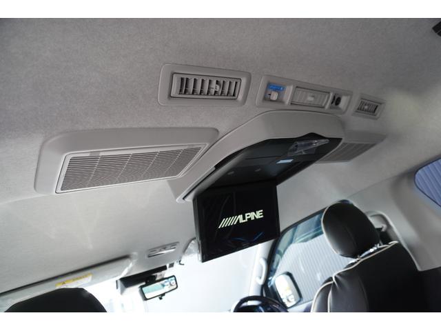 ハイエースワゴン ＧＬ　登録済未使用車３列目対面ラウンジベッド家具オプションベッドフローリングテーブルカスタムコンプリートＩＦ－ＷＢ８フルフラット対面ラウンジアルパインＢＩＧＸ１１ナビ後席１２．８モニターセンターコンソール（46枚目）