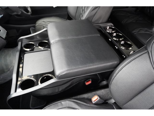 ハイエースワゴン ＧＬ　登録済未使用車３列目対面ラウンジベッド家具オプションベッドフローリングテーブルカスタムコンプリートＩＦ－ＷＢ８フルフラット対面ラウンジアルパインＢＩＧＸ１１ナビ後席１２．８モニターセンターコンソール（49枚目）