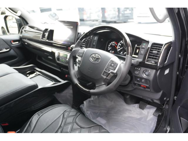 ハイエースワゴン ＧＬ　登録済未使用車３列目対面ラウンジベッド家具オプションベッドフローリングテーブルカスタムコンプリートＩＦ－ＷＢ８フルフラット対面ラウンジアルパインＢＩＧＸ１１ナビ後席１２．８モニターセンターコンソール（58枚目）