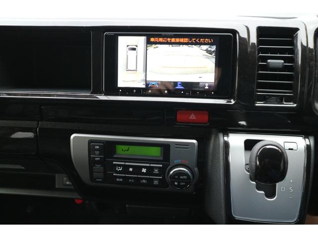 ハイエースワゴン 　登録済未使用車３列目対面ラウンジベッド家具フローリングテーブルＩＦ－ＷＢ８フルフラットベットラウンジ展開カロッツエリアナビ後席モニターミラーリングウッドインテリアバケットシートカバーセンターコンソール（52枚目）