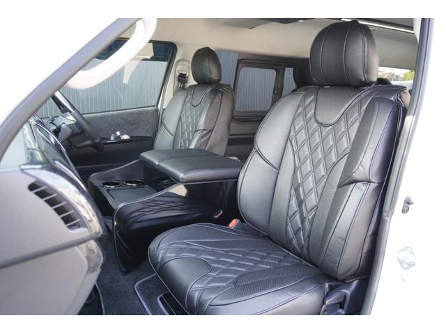 ハイエースワゴン ＧＬ　登録済み未使用車２列目３名Ｉ－ｓｅａｔＲＥＶＯシート対面ラウンジベッド家具ＩＦ－ＷＲ９フローリングテーブル天井間接照明フルフラットベッド対面ラウンジ地ナビ後席モニター天井スピーカーセンターコンソール（52枚目）