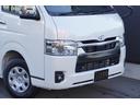 ハイエースバン ロングスーパーGL ダークプライムS 登録済み未使用車2.8D-T4WD3列REVOシート2脚4ナンバー8人ロングスライドレールフローリングフルフラットベッド対面ラウンジ展開ラゲッジトランスポート展開両側電動スライドドア 中古車画像_4