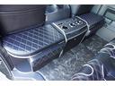 GL 登録済み未使用車2列目3人掛けI-seatREVOシート対面ラウンジベッド家具IF-WR9フローリングテーブルフルフラットベッド対面ラウンジアルパインBIGX11inナビ後席モニターセンターコンソール(24枚目)