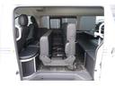 ＧＬ　登録済み未使用車２列目３名Ｉ－ｓｅａｔＲＥＶＯシート対面ラウンジベッド家具ＩＦ－ＷＲ９フローリングテーブル天井間接照明フルフラットベッド対面ラウンジ地ナビ後席モニター天井スピーカーセンターコンソール（29枚目）